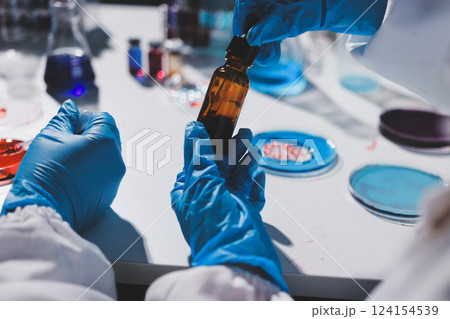 Researchers working in the clinical laboratory Researchers working in the clinical laboratory 124154539