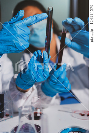 Researchers working in the clinical laboratory 124154579