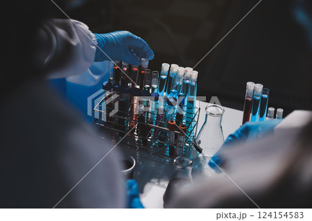 Researchers working in the clinical laboratory Researchers working in the clinical laboratory 124154583