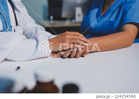 Closeup, doctor holding hands with senior woman and cancer care or support. Healthcare or trust, empathy or compassion and female caregiver or nurse holding elderly person hand for hope and kindness Closeup, doctor holding hands with senior woman and cancer care or support. Healthcare or trust, empathy or compassion and female caregiver or nurse holding elderly person hand for hope and kindness 124154598