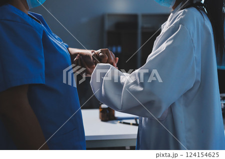 Orthopedist examining patient in hospital 124154625