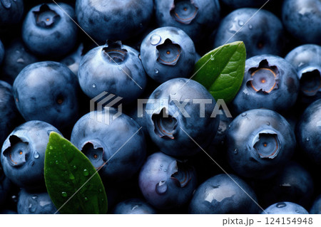 AI generated Fresh ripe blueberries showing vivid color and water droplets 124154948