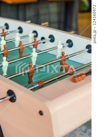 Foosball Table Close-Up, Game Detail, Sport Equipment, Indoor Activity, Play. High quality photo Foosball Table Close-Up, Game Detail, Sport Equipment, Indoor Activity, Play. High quality photo 124160972