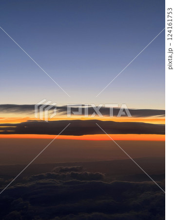 Sunset from the airplane window 124161753