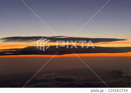 Sunset from the airplane window 124161754