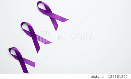 Purple ribbon held, symbol of support, Purple Epilepsy Awareness Day Purple ribbon held, symbol of support, Purple Epilepsy Awareness Day 124161892