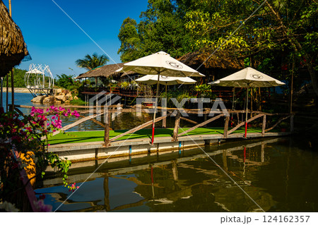 Cafe on the water in the park. 124162357