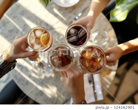 A trendy cafe scene with Carajillo cocktails being served to guests, after-dinner coffee cocktail 124162901