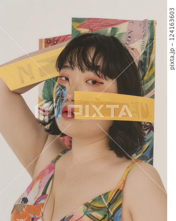 Floral abstract portrait with yellow paper collage 124163603