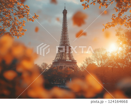 Stunning autumn sunset view of Eiffel Tower through colorful foliage in Paris 124164668