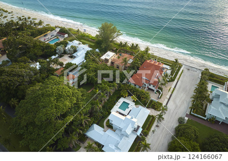 Aerial view of rich neighborhood with expensive vacation homes in Boca Grande, small town on Gasparilla Island in southwest Florida. American dream homes as example of real estate development in US 124166067