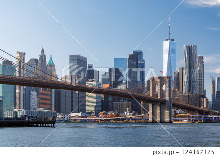 A panoramic view of the Brooklyn Bridge stretching towards Manhattan 124167125