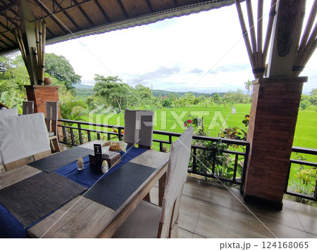 Traditional Bali style outdoor cafe in Ubud with view on forest, Bali, Indonesia Traditional Bali style outdoor cafe in Ubud with view on forest, Bali, Indonesia 124168065