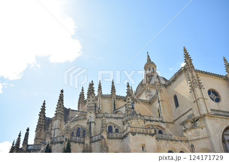Gothic Cathedral of Segovia with pinnacles and architraves and lobed arches 124171729