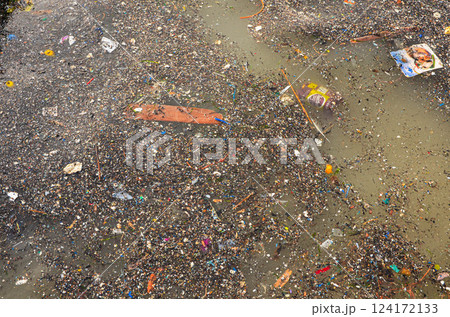 Environmental Pollution Floating Trash in Contaminated Water Environmental Pollution Floating Trash in Contaminated Water 124172133