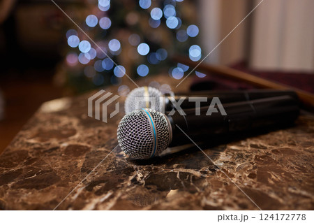 Professional microphones on a marble surface designed for recording and audio Professional microphones on a marble surface designed for recording and audio 124172778