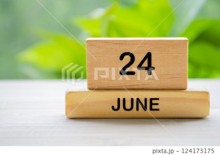 24 June wooden calendar with customizable space for text or ideas. June month concept. 24 June wooden calendar with customizable space for text or ideas. June month concept. 124173175