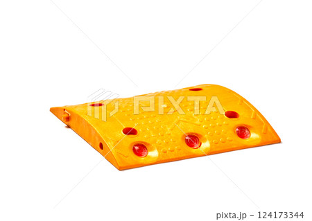 Bright Orange Rubber Speed Bump with Reflective Strips for Enhanced Safety and Visibility on Roadways and Parking Lots, Designed to Manage Vehicle Speed Effectively 124173344