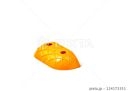 Bright Orange Plastic Item Designed with Pineapple Shape and Texture, Perfect for Use in Various Creative Projects and Playful Activities Bright Orange Plastic Item Designed with Pineapple Shape and Texture, Perfect for Use in Various Creative Projects and Playful Activities 124173351