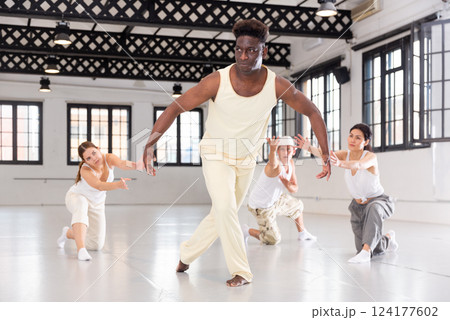 dancers training in a dance studio dancers training in a dance studio 124177602