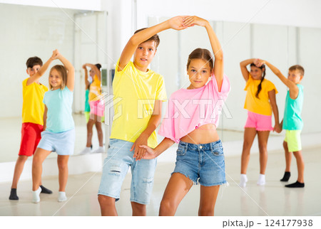 Portrait of children enjoying of partner dance in class Portrait of children enjoying of partner dance in class 124177938