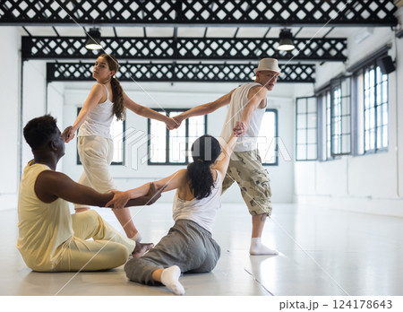 Group of artists demonstrating art performance 124178643