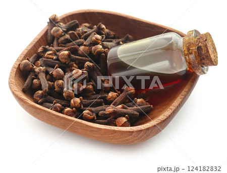 Fresh clove with oil in a jar Fresh clove with oil in a jar 124182832