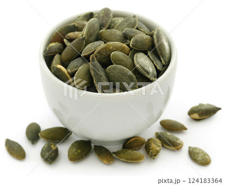 Pumpkin seeds roasted and salty Pumpkin seeds roasted and salty 124183364