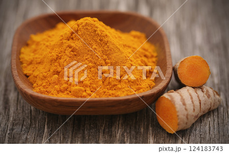Raw turmeric with powder Raw turmeric with powder 124183743