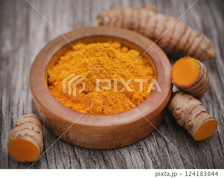 Raw turmeric with powder Raw turmeric with powder 124183844