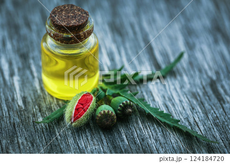 Poppy seeds with essential oil Poppy seeds with essential oil 124184720