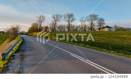 Road throught Danish agricultural field Road throught Danish agricultural field 124184999