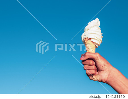 Hand holding an icecream 124185130