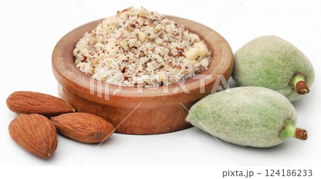 Crushed with green and peeled almond Crushed with green and peeled almond 124186233