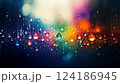 カラフルな光に反射する雨粒 124186945