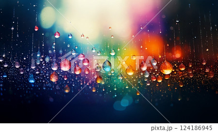 カラフルな光に反射する雨粒 カラフルな光に反射する雨粒 124186945