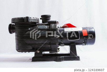 Sand filter pump for swimming pool on isolated background. Electric pump for swimming pool on white background. Pool water pump on isolated background 124189607