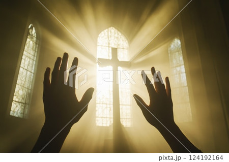 Faithful Hands Raised in Worship with Sunlit Windows 124192164