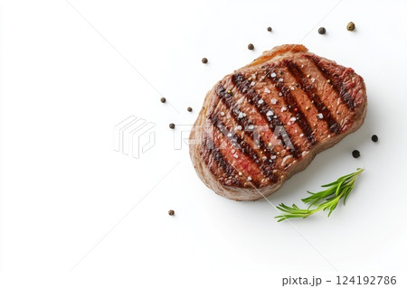 Close-Up of Grilled Beef Sirloin Steak on White Background 124192786