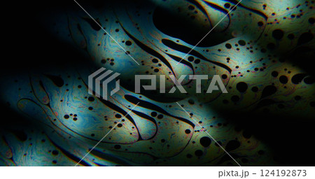Art flow. Multicolor paint. Spectrum petrol droplet stream clone spill abstract pattern on black liquid background. Defocused duplicated gradient mix. Art flow. Multicolor paint. Spectrum petrol droplet stream clone spill abstract pattern on black liquid background. Defocused duplicated gradient mix. 124192873