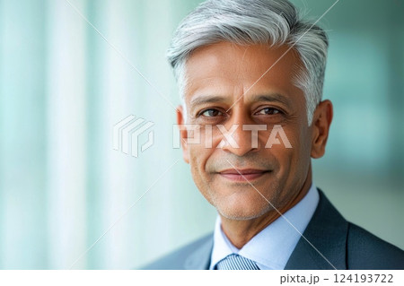 Experienced boss smiling in formal suit Experienced boss smiling in formal suit 124193722