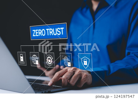 Zero Trust Security and Cyber Protection Concept. Businessman use laptop with interface "Zero Trust" security icons, advanced cybersecurity measures, data protection, and restricted access protocols. 124197547
