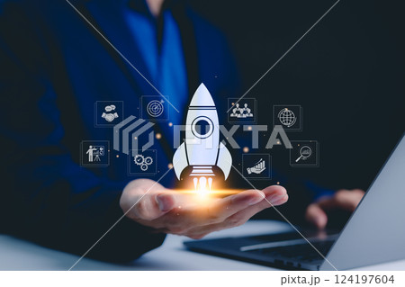 Businessman holding icons business growth and investment, Rocketing take off with a targeted launch speed, Wealth fast, Graph depicting rising earning, increasing profits exemplifies financial success Businessman holding icons business growth and investment, Rocketing take off with a targeted launch speed, Wealth fast, Graph depicting rising earning, increasing profits exemplifies financial success 124197604