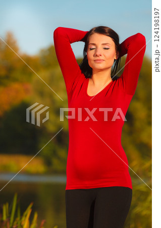 Relaxed calm pregnant woman in park outdoor 124198197