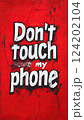 Bold graffiti-style text "Don't touch my phone" with a cracked effect, isolated on a deep red background 124202104