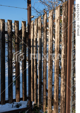 Rustic old wooden fence, detail. Rustic old wooden fence, detail. 124203299