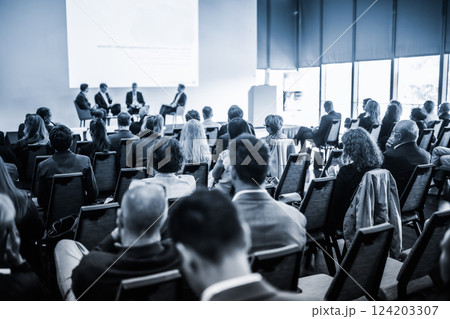 Interview and round table discussion at business convention and presentation. Audience at the conference hall. Business and entrepreneurship symposium. 124203307