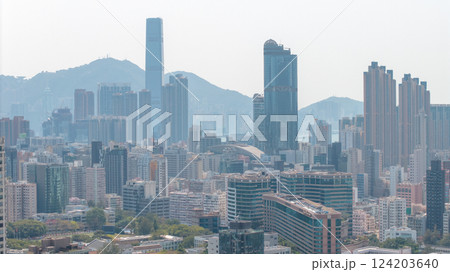 March 19 2025 Modern Cityscape With High-Rise Buildings and Mountain Views 124203640