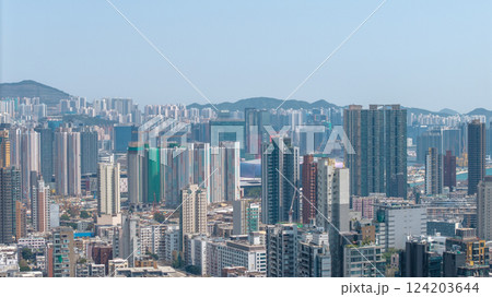 March 19 2025 Urban Skyline With High-Rise Buildings and Mountains March 19 2025 Urban Skyline With High-Rise Buildings and Mountains 124203644