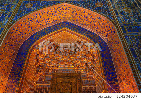 Colourful gold painting of arches and domes of Tilla-Kari Madrasah. Samarkand, Uzbekistan. Colourful gold painting of arches and domes of Tilla-Kari Madrasah. Samarkand, Uzbekistan. 124204637